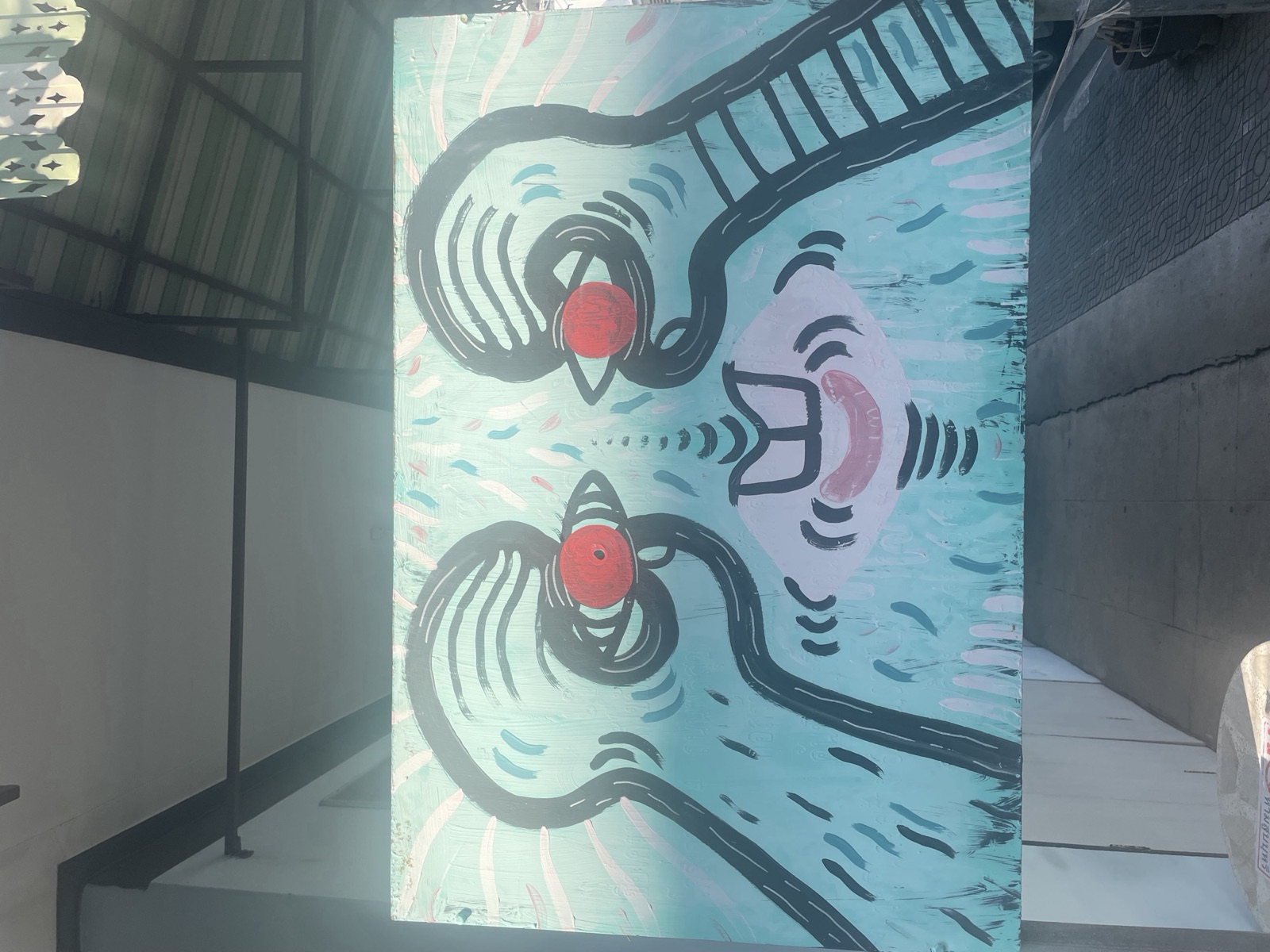 Art — face on a wall